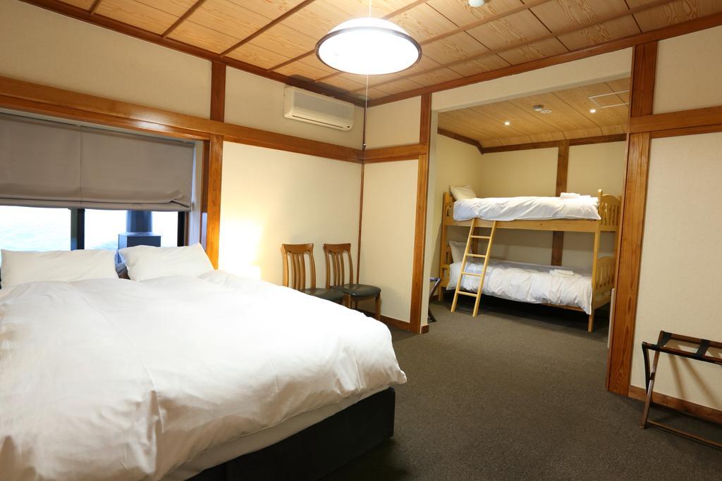 Snowlines Lodge Хакуба-Мура Номер фото
